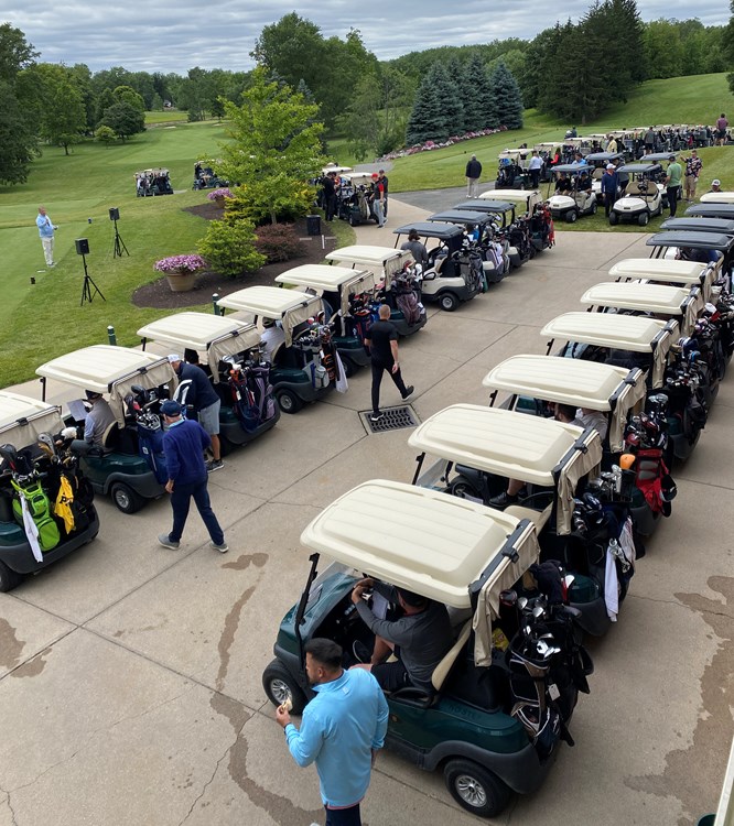 Golf carts waiting to start